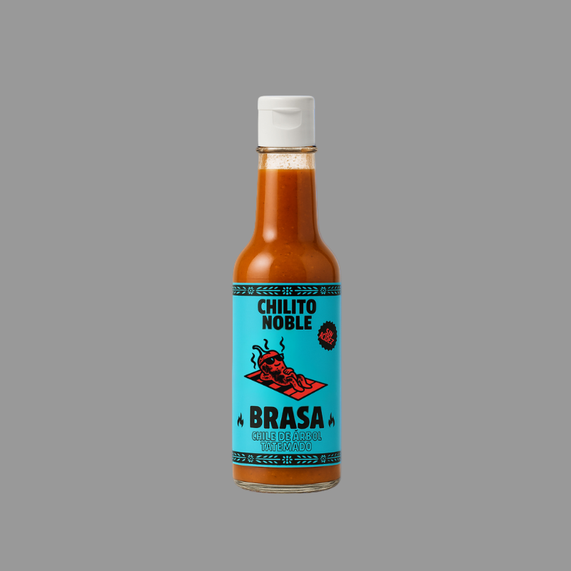 Botella de salsa Brasa Chilito Noble con sabor ahumado.