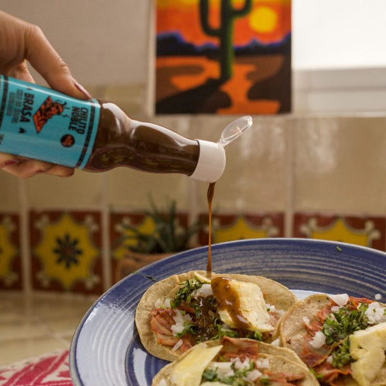 Brasa sobre tacos al pastor